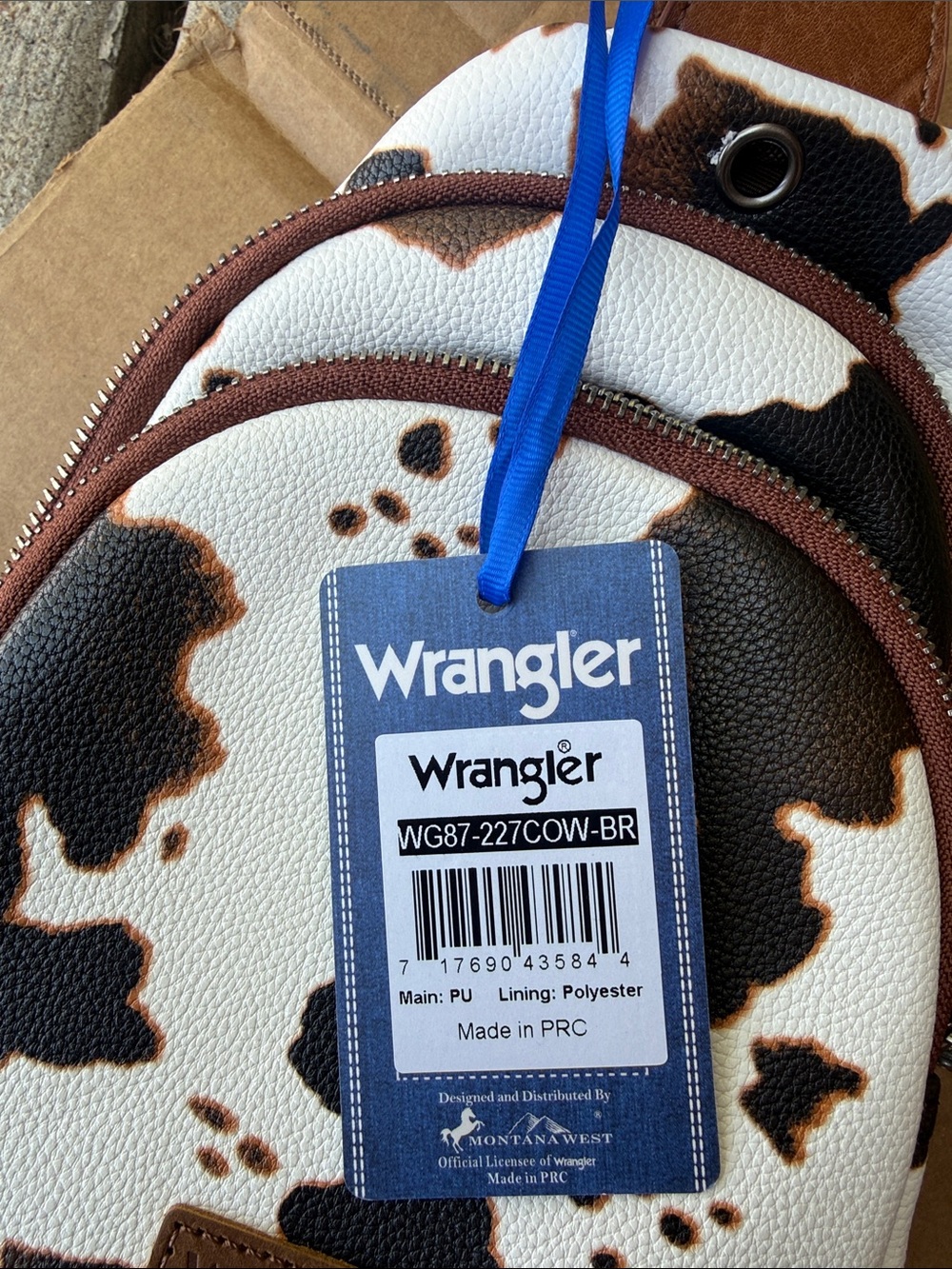 Wrangler White, Black & Brown Cowprint Sling Bag - Picture 2 of 3